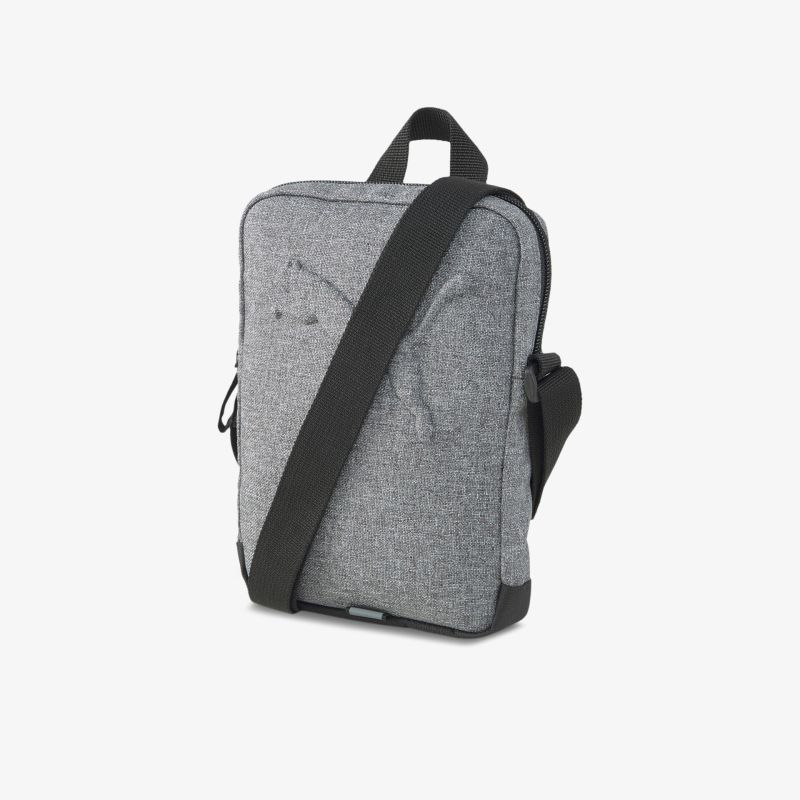 Graue Umhängetasche mit verstellbarem Gurtband, ideal für täglichen Gebrauch und Reisen.