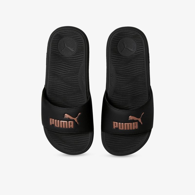 Schwarze Slides mit komfortabler Passform und auffälligem Markenlogo auf dem Fußriemen.