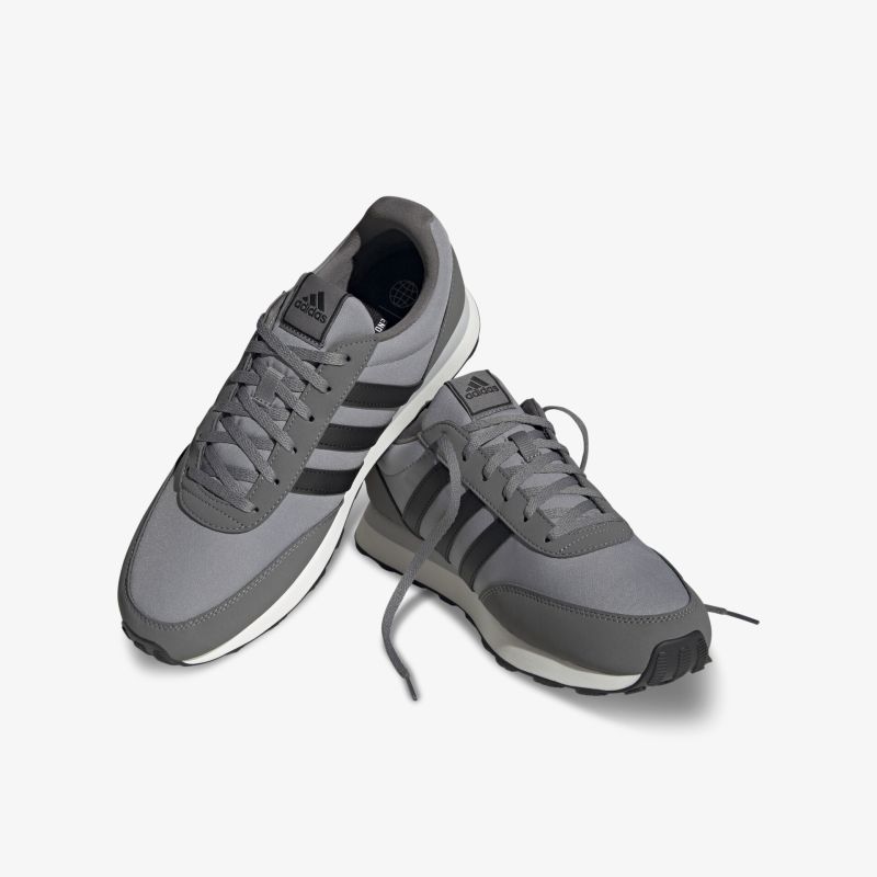 Moderne graue Sneaker mit sportlichem Design und hohem Tragekomfort.