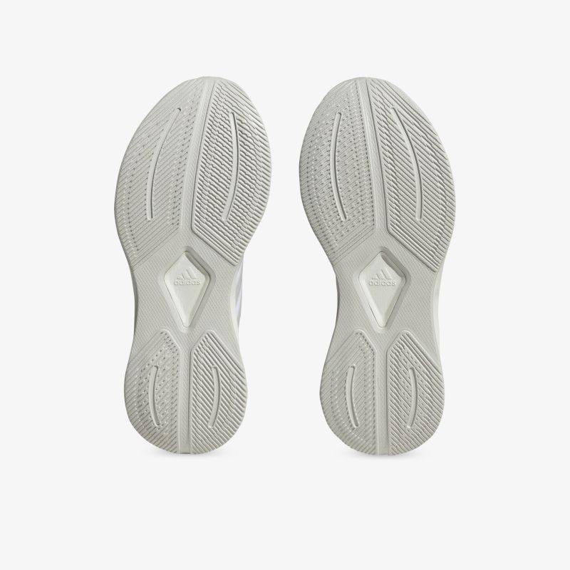 Hochwertige, rutschfeste Sportschuhsohlen mit stoßdämpfender Technologie für optimalen Komfort.