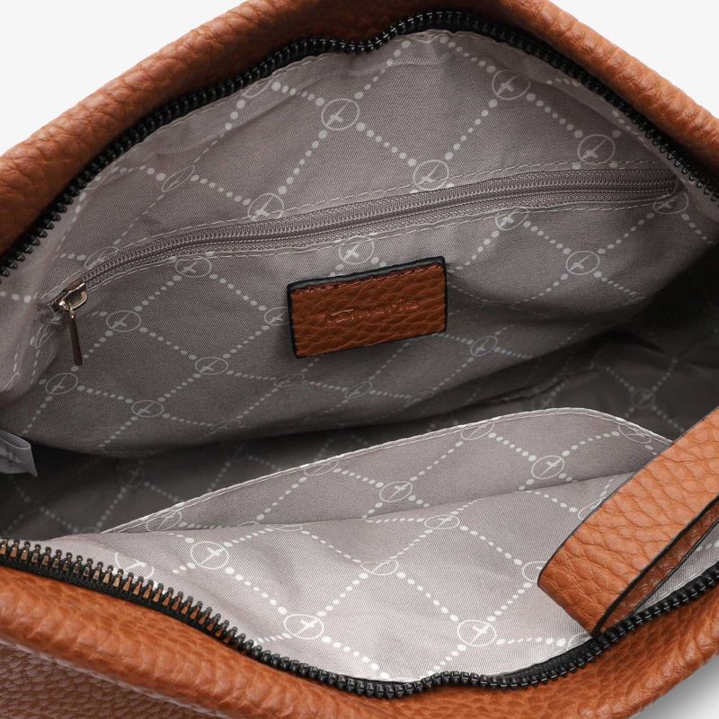 Geräumiges Innenfach einer hochwertigen Tasche mit elegantem Reißverschluss und stilvollem Design.