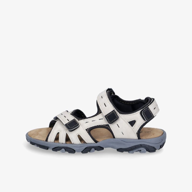 Bequeme weiße Sandale mit verstellbaren Klettverschlüssen und stabiler, sportlicher Sohle seitlich.