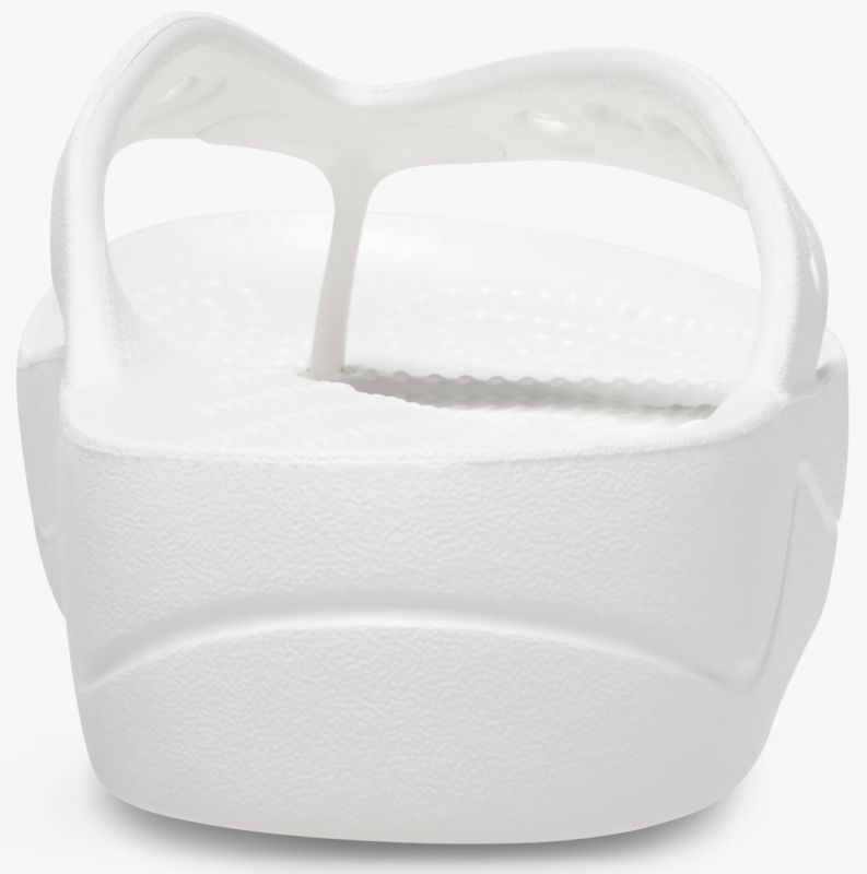 Weißer Zehentrenner mit ergonomischem Design für maximalen Komfort und rutschfester Sohle.