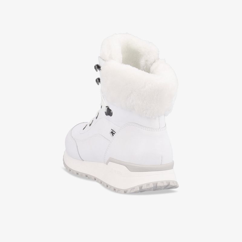 Stilvoller weißer Winterstiefel mit warmem Fellkragen und robuster Sohle für optimalen Komfort und Halt.