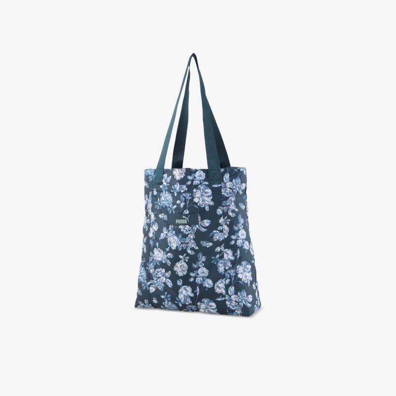 Stilvolle Tragetasche mit floralem Design, ideal für Einkäufe und Freizeit. Robuste Henkel, komfortabel zu tragen.