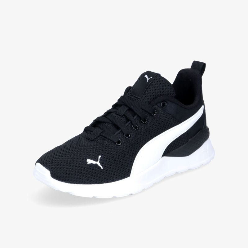 Eleganter schwarzer Sneaker mit weißem Akzent, ideal für Sport und Freizeit, bietet Komfort und Stil.