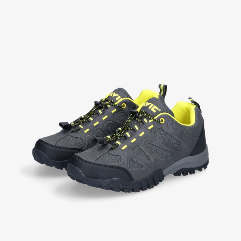 Robuste Wanderschuhe mit rutschfester Sohle, gelben Details und sportlichem Design. Perfekt für Outdoor-Aktivitäten.