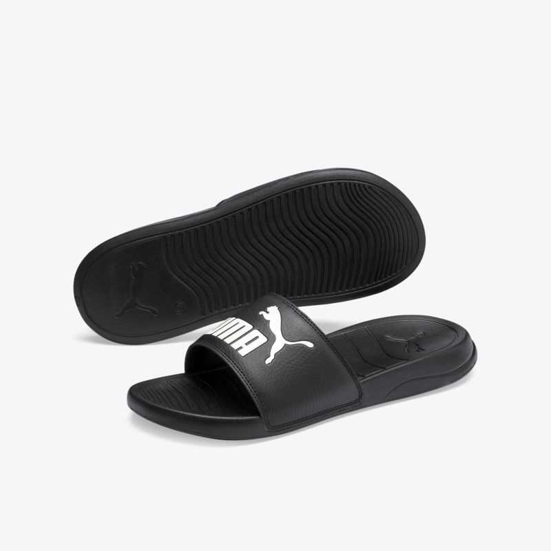 Bequeme schwarze Sandalen mit markantem Logo, ideal für Alltag und Freizeit. Robustes Design und rutschfeste Sohle.