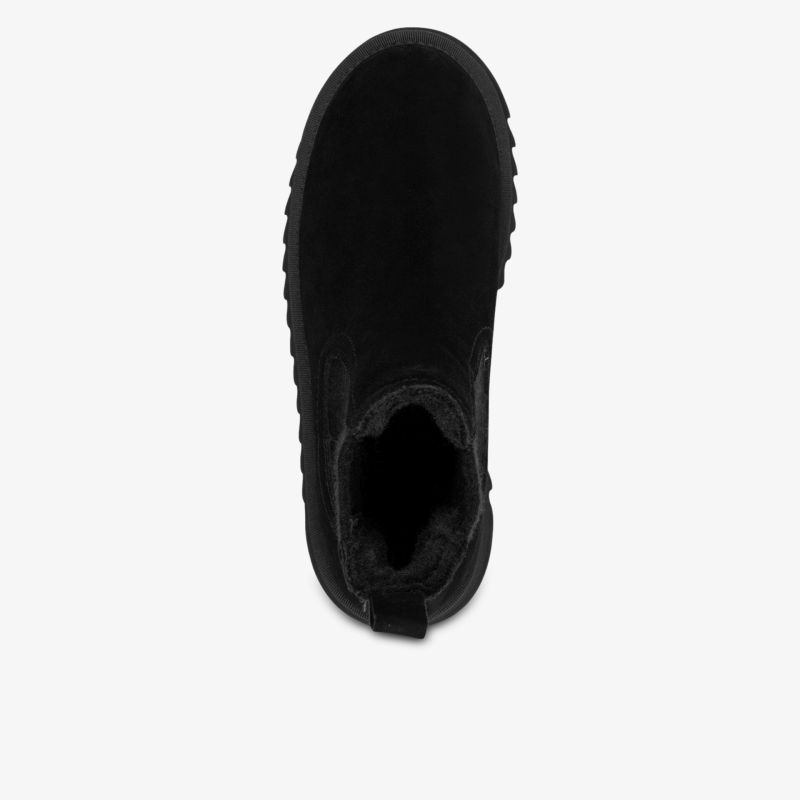 Obere Draufsicht auf bequemen Schuh mit weichem Innenfutter und rutschfester Sohle, ideal für kalte Tage