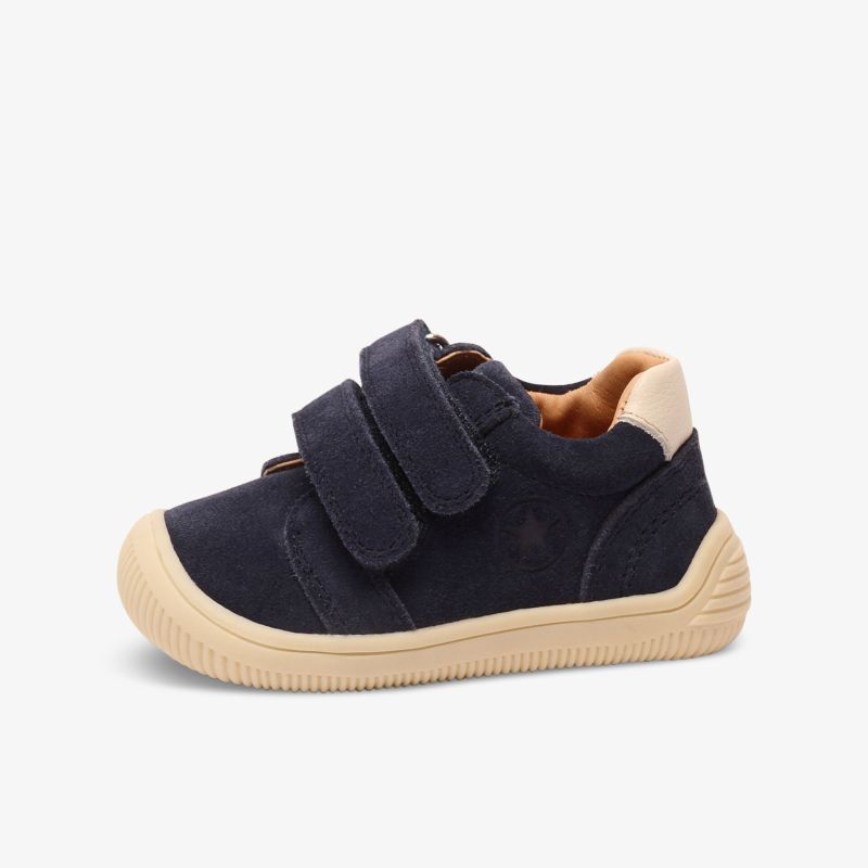 Bequemer Kinderschuh in Dunkelblau mit rutschfester Sohle und praktischem Klettverschluss für einfaches Anziehen.