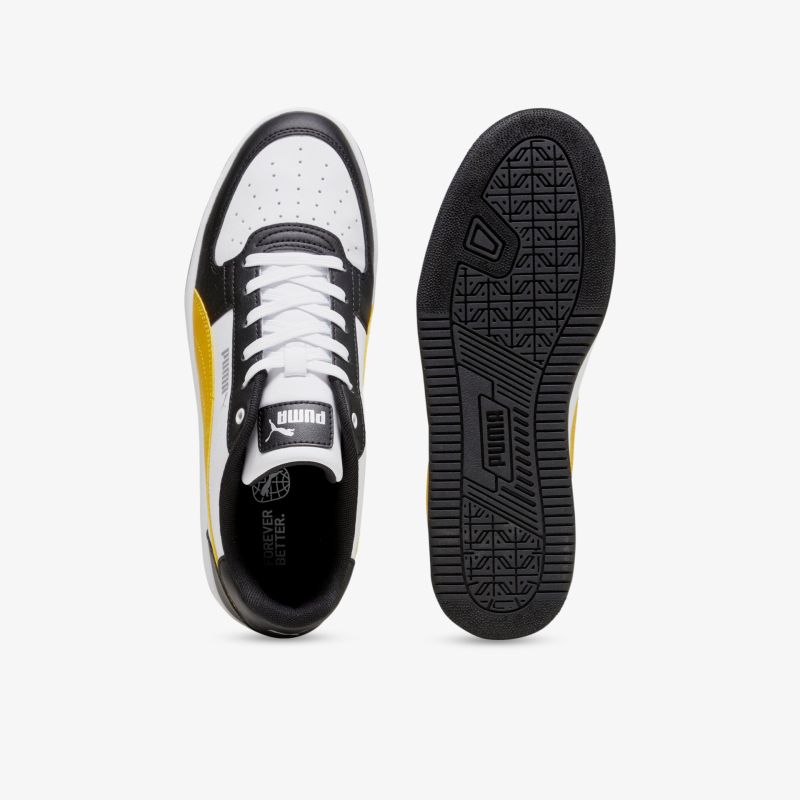 Modischer Sneaker mit rutschfester Sohle und sportlichem Design in Schwarz-Weiß-Gelb.