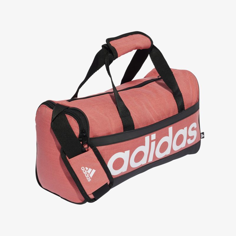 Stilvolle adidas Sporttasche in Pink mit geräumigem Design, ideal für Training und Reisen.