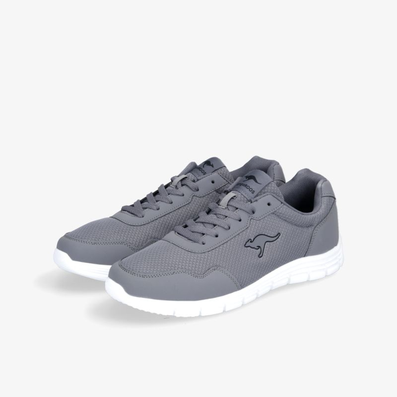 Moderne graue Sneaker mit weißer Sohle, sportliches Design, ideal für Komfort und Stil im Alltag.
