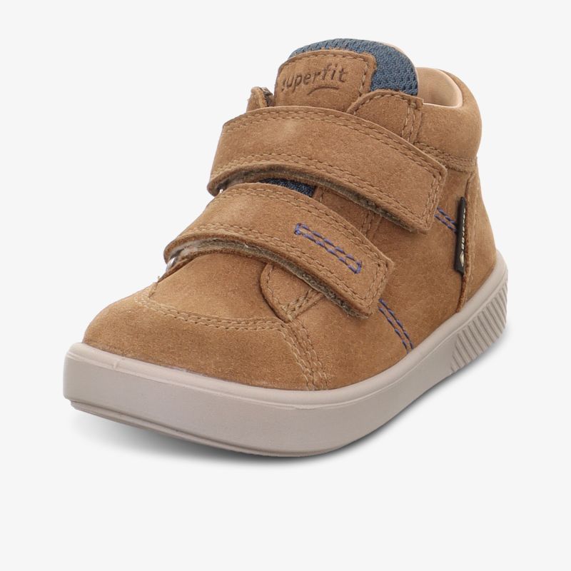 Stylischer Schuh mit Klettverschluss und rutschfester Sohle für optimalen Tragekomfort und Halt.