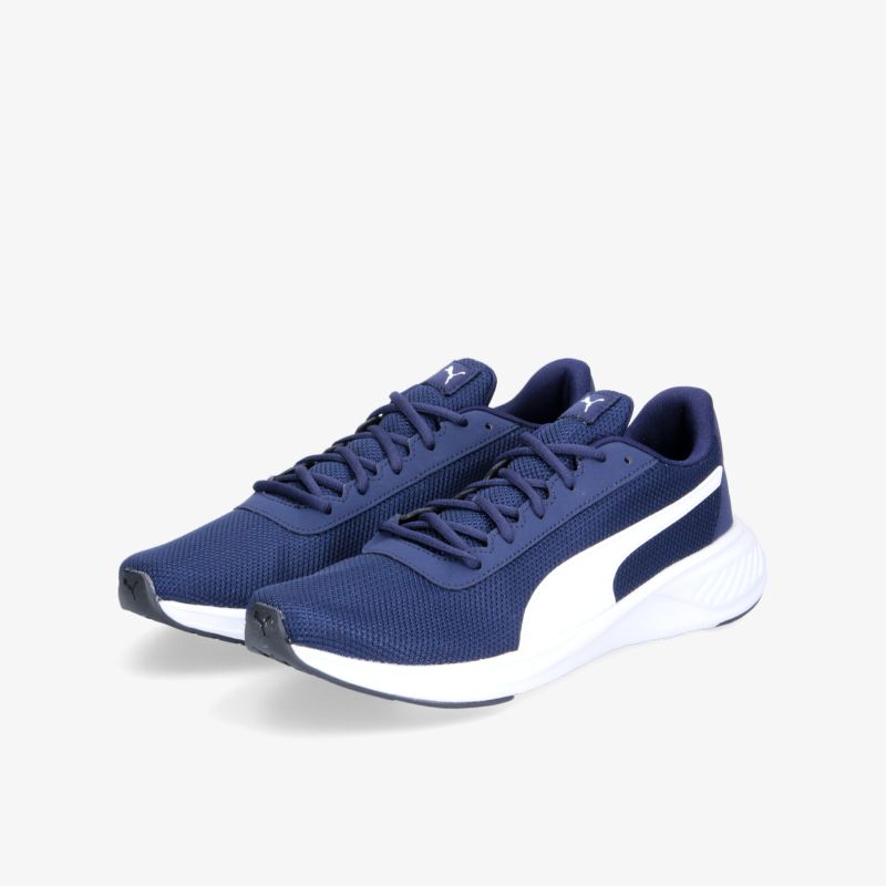 Blaue Sportschuhe mit weißem Logo und flexiblem Design, ideal für Komfort und Stil im Alltag.