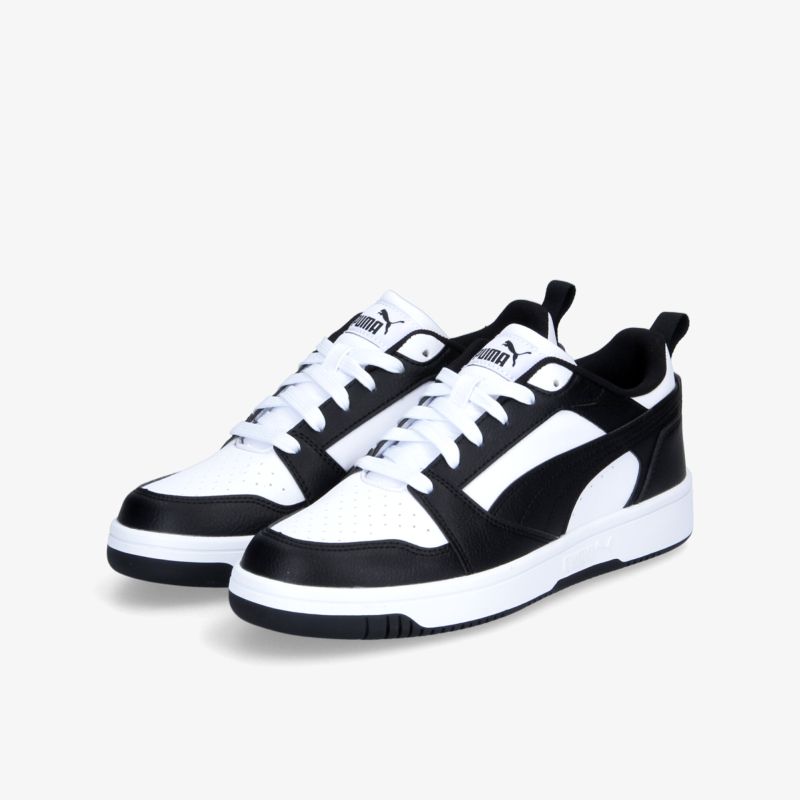 Schwarz-weiße Sneakers mit modischem Design, ideal für Freizeit und sportliche Aktivitäten. Komfort und Stil vereint.