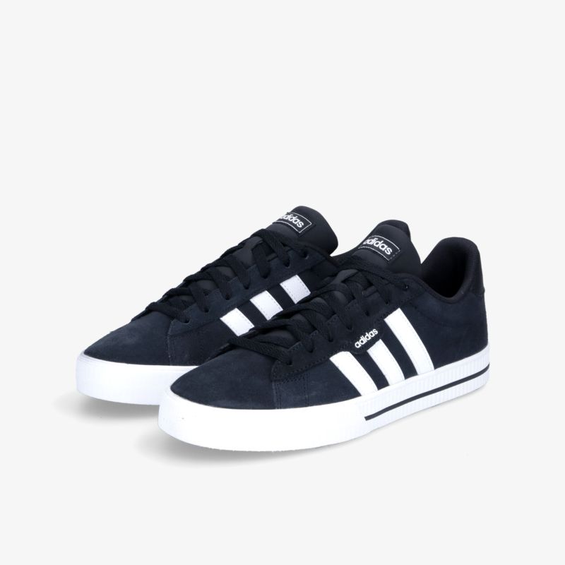 Moderne schwarze Sneaker mit weißen Streifen, ideal für den täglichen Gebrauch und vielseitig kombinierbar.