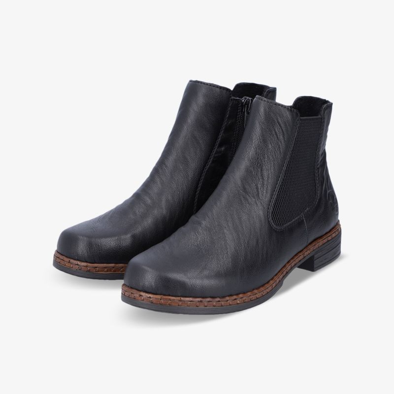 Elegante schwarze Stiefeletten mit seitlichem Reißverschluss und robustem Design für vielseitigen Tragekomfort.