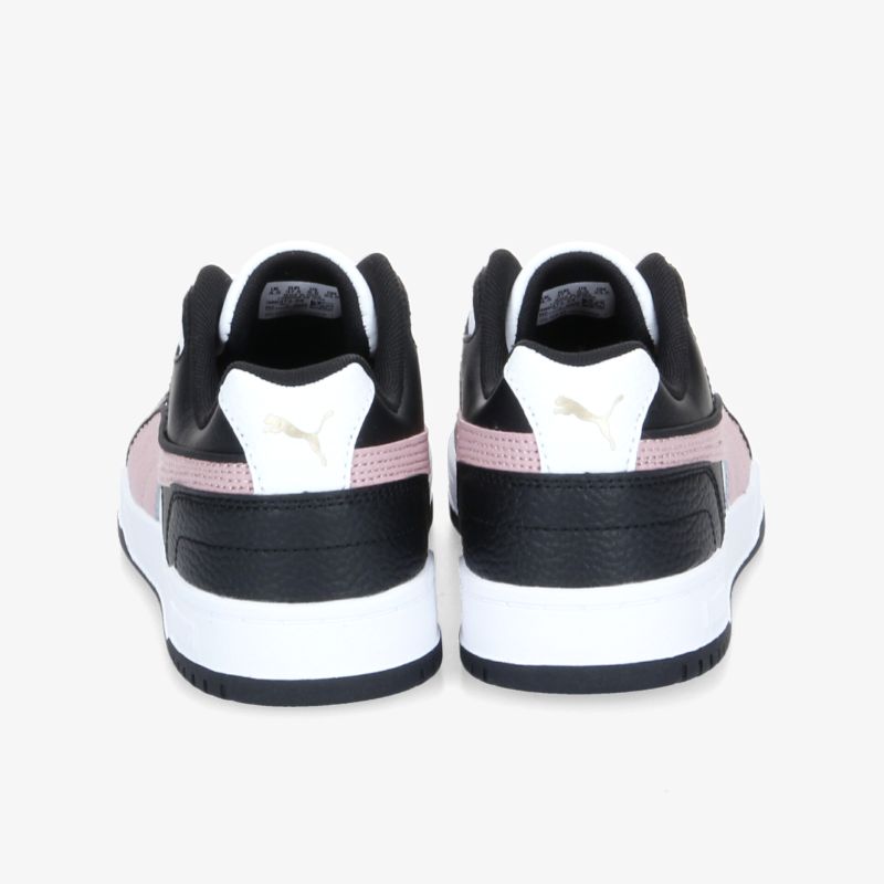 Sportliche, stilvolle Sneakers in Schwarz-Weiß mit rosa Akzent und robuster Sohle für optimalen Halt.