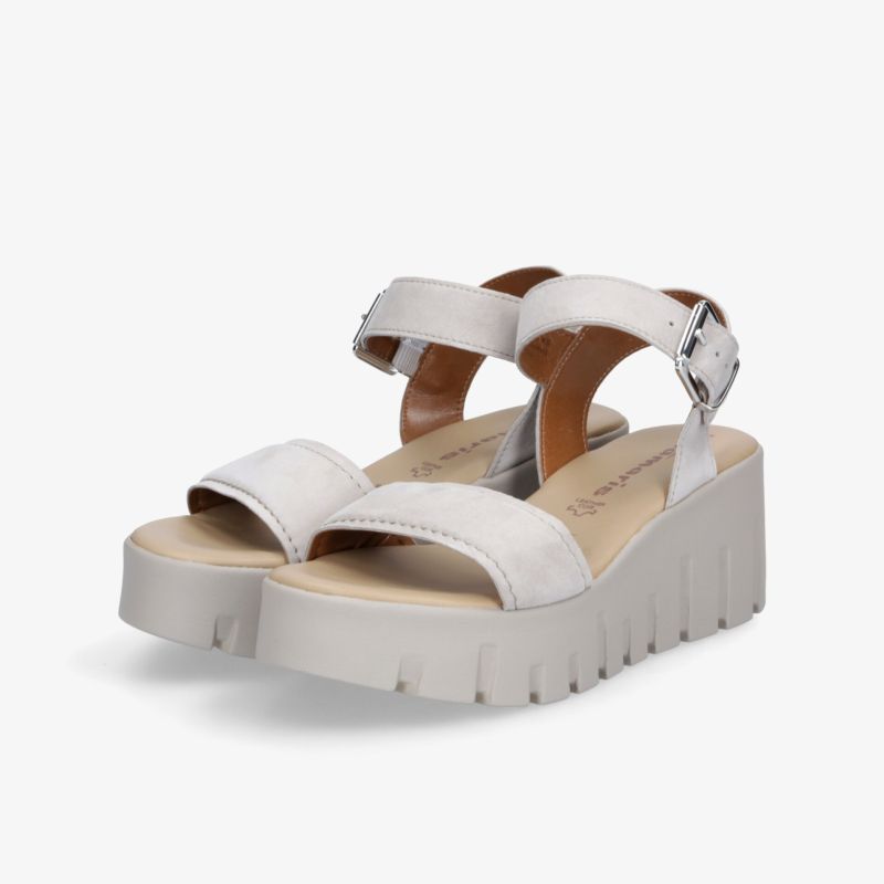 Weiße Sandale mit verstellbarem Riemen und dicker Plateau-Sohle, komfortabel und modisch zugleich