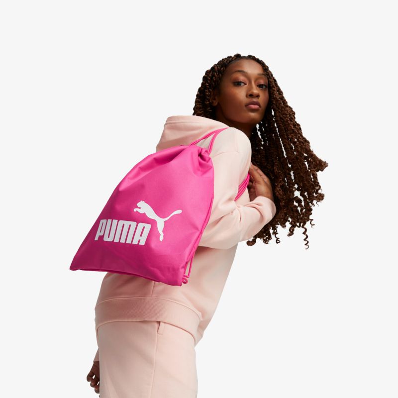 Stylischer pinker PUMA Beutel mit weißem Logo, ideal für Freizeit und Sportaktivitäten.