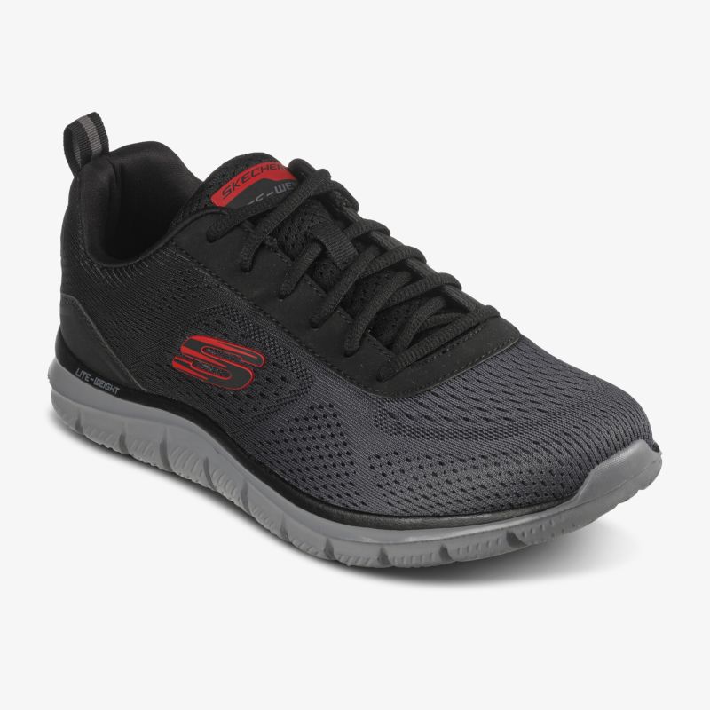 Schwarzer Turnschuh mit grauer Sohle, sportliches Design, atmungsaktives Material, bequemer Alltagsbegleiter.