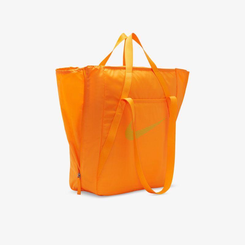 Geräumige orange Tasche mit praktischen Trägern und modernem Design, ideal für den Alltag.