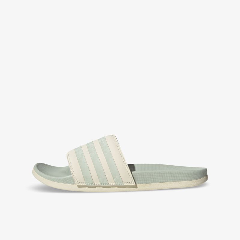 Bequeme und stilvolle Pantoletten mit gestreiftem Riemen und rutschfester Sohle, ideal für sommerliche Freizeitaktivitäten.