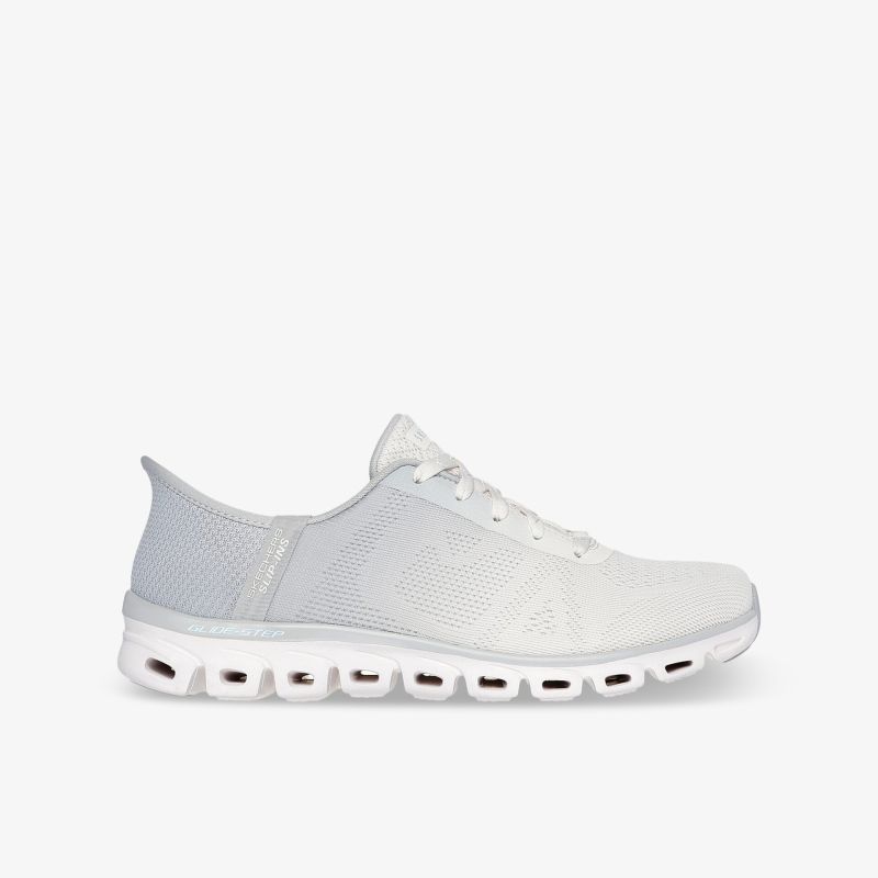 Moderner weißer Sportschuh mit atmungsaktivem Material und flexibler, stoßdämpfender Sohle in seitlicher Ansicht.