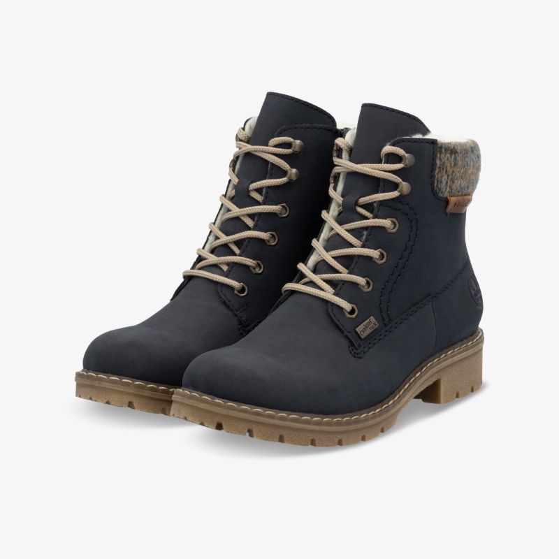 Robustes Paar schwarzer Winterstiefel mit gepolstertem Schaft und rutschfester Sohle für optimalen Komfort und Halt