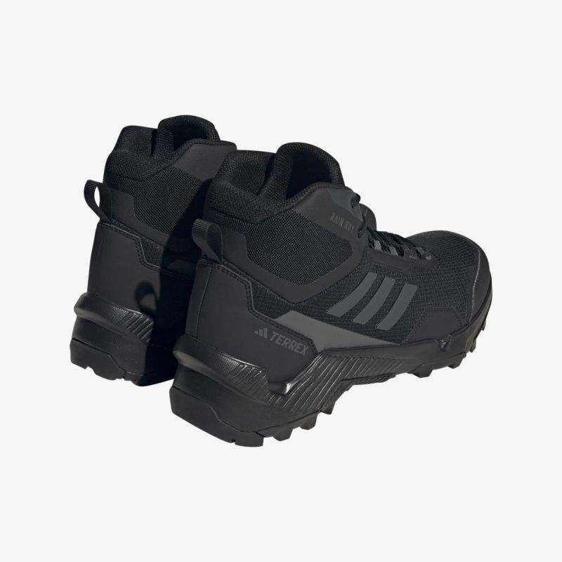 Strapazierfähige schwarze Outdoor-Schuhe mit stabilem Profil und hochwertiger Verarbeitung für maximalen Komfort.