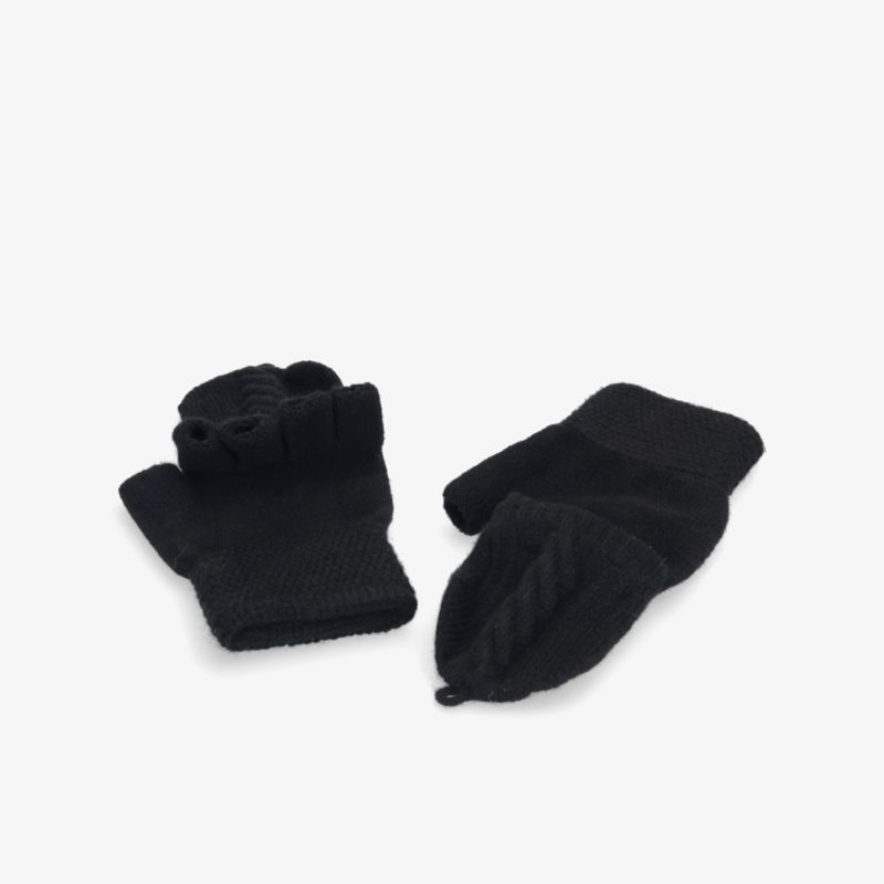 Schwarze Strickfäustlinge für ultimativen Komfort und Wärme an kalten Tagen. Stilvolles Accessoire für den Winter.