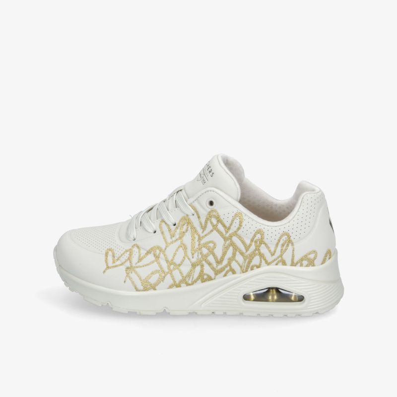 Moderner weißer Sportschuh mit goldener Verzierung seitlich, bequem und leicht, ideal für aktiven Alltag