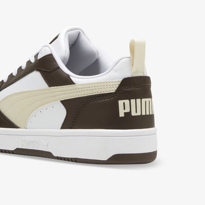 Sportlicher PUMA Sneaker in Beige und Weiß mit robustem Material und hohem Tragekomfort, seitliche und hintere Ansicht