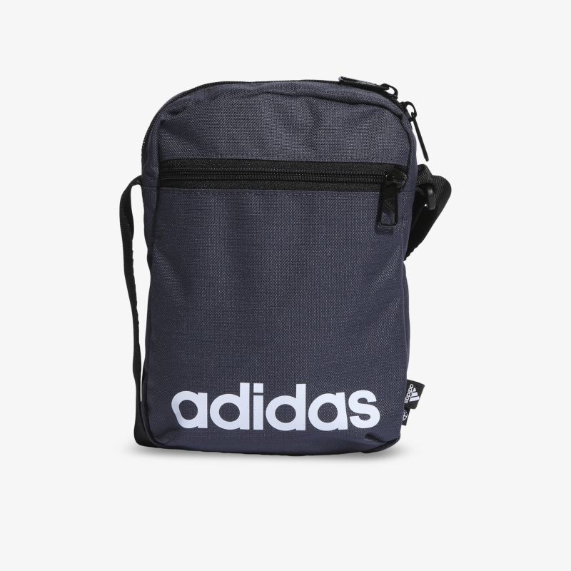 Kompakte adidas Schultertasche in Blau mit Reißverschluss, praktische und moderne Aufbewahrung für unterwegs.
