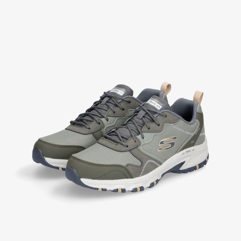 Robuste und bequeme Sneakers in Grau mit gepolsterter Sohle und atmungsaktivem Material für optimalen Tragekomfort.