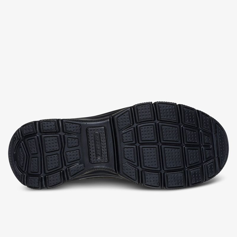 Robuste schwarze Schuhsohle mit rutschfestem, flexiblem Profil für optimalen Halt und Komfort