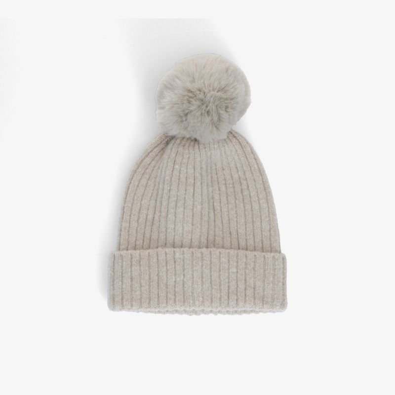 Beige Strickmütze mit Pom-Pom für stilvolle Winterwärme und hohen Tragekomfort.
