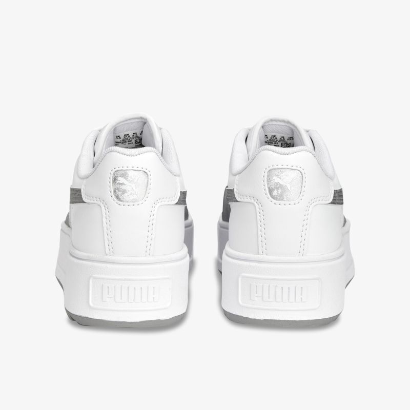 Weißer Sneaker von Puma mit klassischem Design und robuster Sohle. Ideal für einen stilvollen Auftritt.