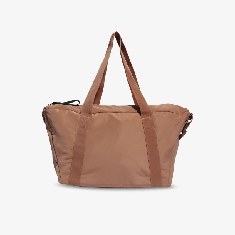 Geräumige braune Tasche mit stilvollen robusten Henkeln, perfekt für Alltag und Reisen.