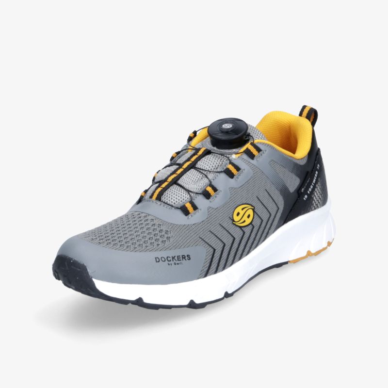 Moderner grauer Sneaker mit gelben Akzenten, schnellem Schnürsystem und rutschfester Sohle für sportlichen Komfort.