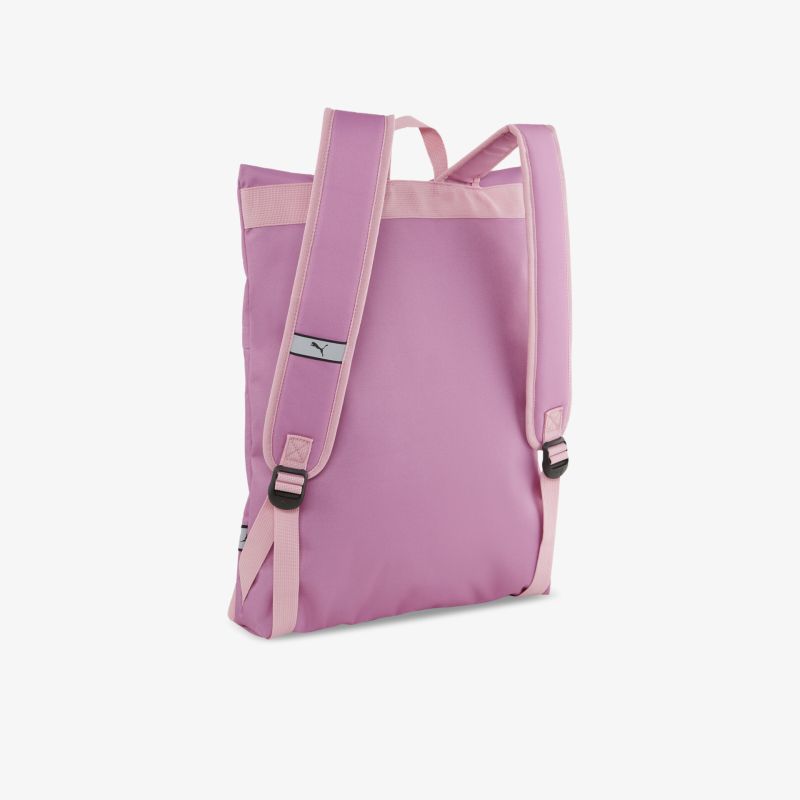 Seitliche Ansicht eines leichten rosa Rucksacks mit verstellbaren Schultergurten und robustem Material