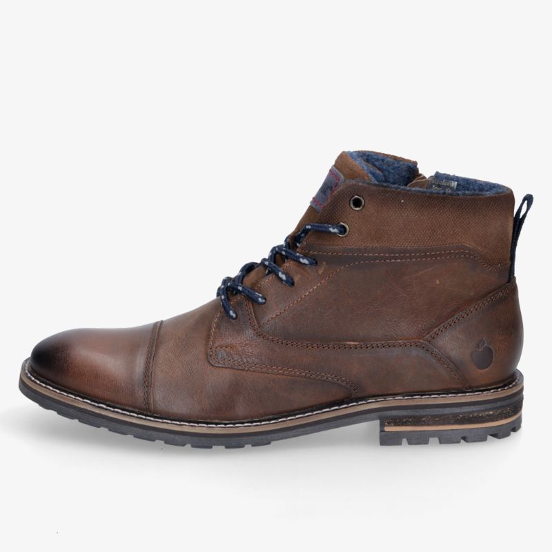Klassischer Lederstiefel, perfekt für kalte Tage, mit robuster Sohle und warmem Innenfutter.