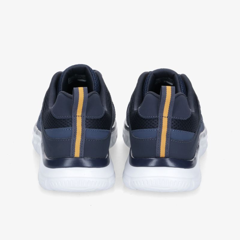 Bequeme und modische Sneakers in Blau mit gelbem Streifen und rutschfester Sohle. Ideal für sportliche Aktivitäten.