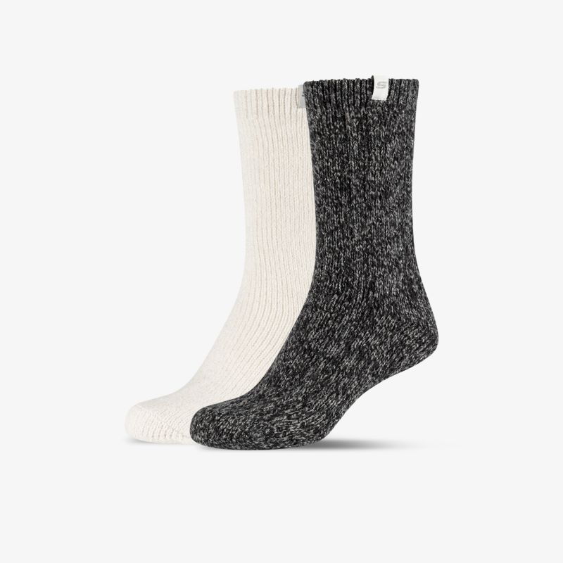 Zwei Paar gemütliche, elastische Socken in Weiß und Schwarz, perfekt für den täglichen Komfort und Halt