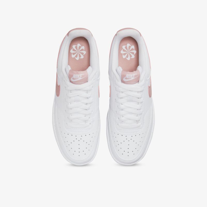 Stylische weiße Sneakers mit rosa Akzenten für maximalen Komfort und sportlichen Look.