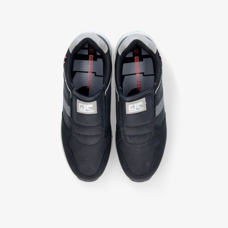 Moderne schwarze Sneaker mit Klettverschluss und rutschfester Sohle, ideal für den Alltag.