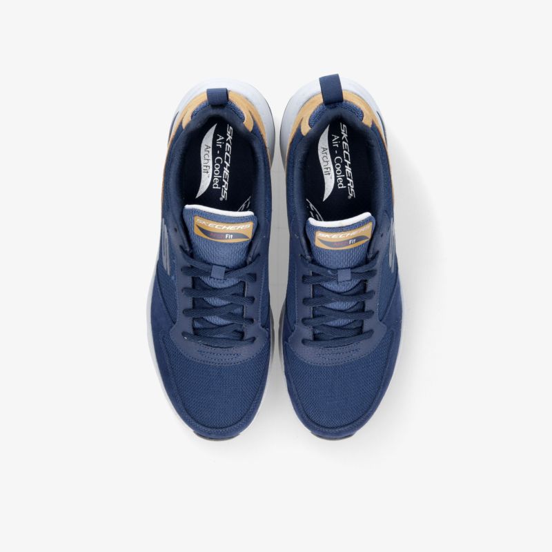 Moderne blaue Sneaker mit komfortabler Passform und sportlichem Design von oben betrachtet.