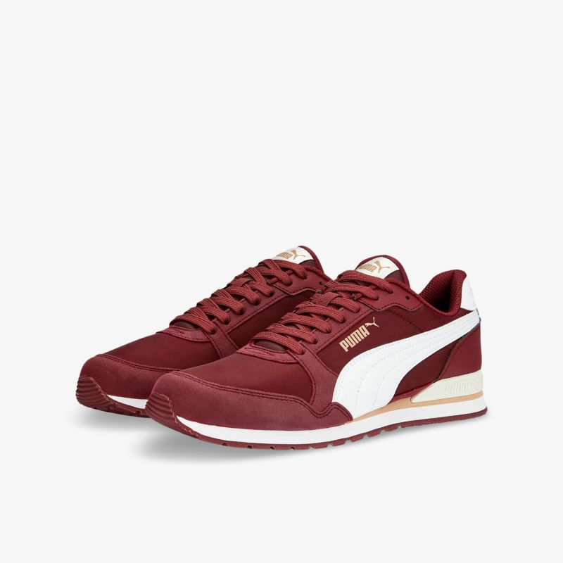 Moderner roter Sneaker mit kontrastierendem weißen Streifen und bequemem Design für Freizeit und Sport.