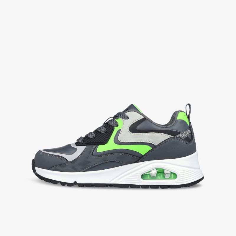 Sportlicher Sneaker in Grau und Grün mit federnder Sohle und modernem Design, seitliche Ansicht